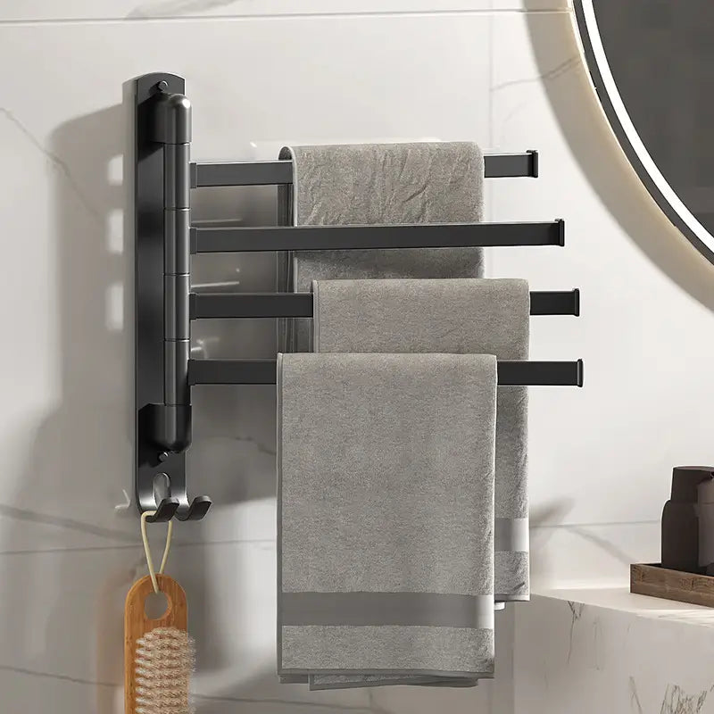 Modern wall-mounted towel rack in a luxury marble bathroom with round mirror